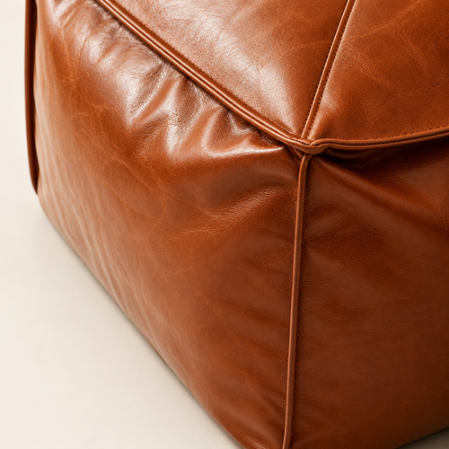 Large and elegant leather pouf: comfort and versatile uses