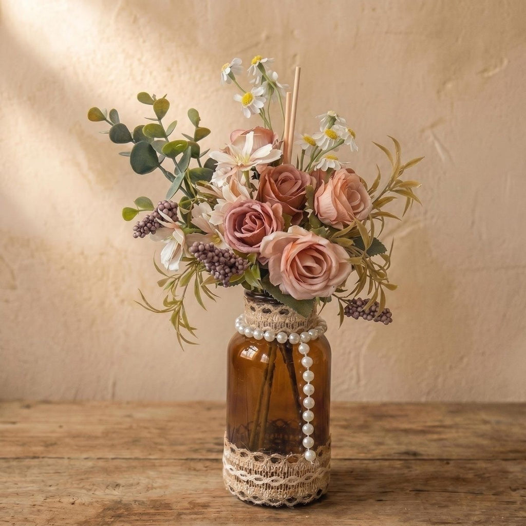 Glass vase with a bouquet of dried flowers